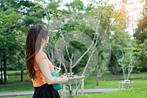 Young girl playing music with ukulele relax