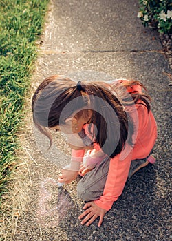 Young girl playing outside.