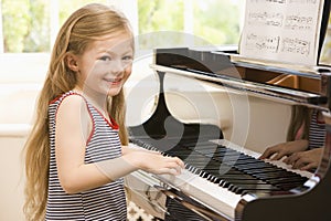Young Girl Playing Piano