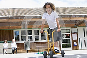 A young girl playing in a playground