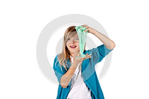 Young girl playing with slime.