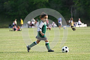 Young Girl Playing Soccer