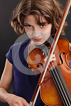 Young girl playing the violin