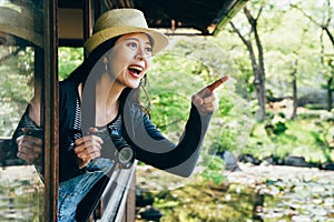 Young girl pointing finger to nihon teien photo