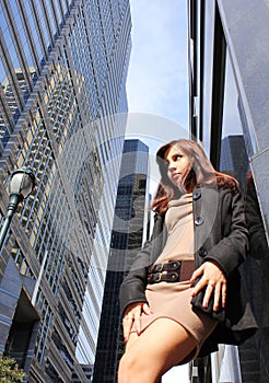 Young girl posing in a city