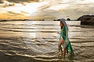 Young girl posses at Ao Nang Beach, Krabi, Thailand
