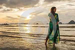 Young girl posses at Ao Nang Beach, Krabi, Thailand