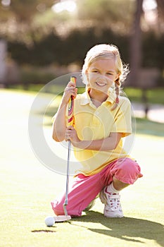 Young Girl Practising Golf