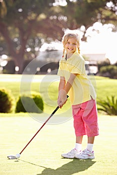 Young Girl Practising Golf