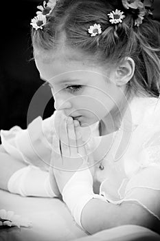 Young girl praying