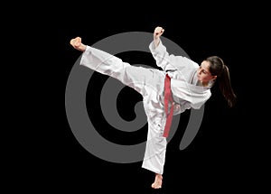 Young girl preforming karate martial arts