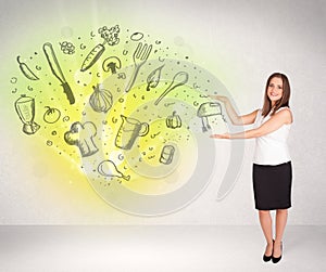 Young girl presenting nutritional cloud with vegetables