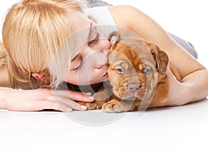 Young girl with puppy of Dogue de Bordeaux photo