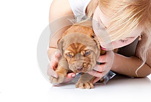 Young girl with puppy of Dogue de Bordeaux