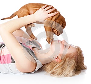 Young girl with puppy of Dogue de Bordeaux