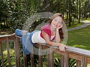 Young Girl on Railing