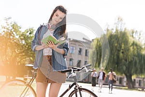 Young girl reading book