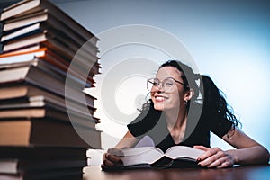 Young girl reading very interesting book at home