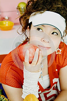 Young girl and red apple