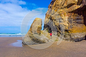 Small Child Hikes Hug Point Rock Formation Oregon Coast photo