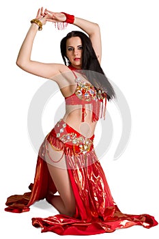 Young girl in a red suit oriental dance