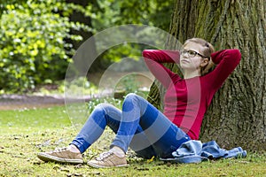 Young girl resting in the park