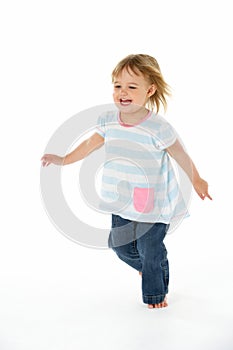 Young Girl Running In WhiteStudio
