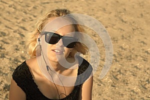 Young girl on the sandy beach