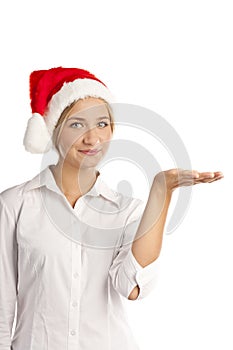 Young girl with Santa hat in the studio on white