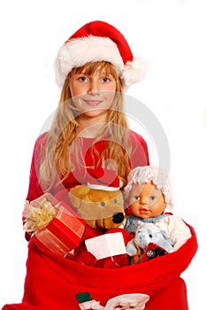 Young girl with santa`s sack photo
