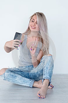 Young girl selfie phone carefree idle leisure