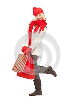 Young girl with shopping bags