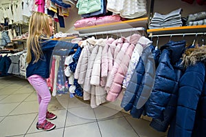 Young girl shopping for new clothes