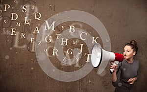 Young girl shouting into megaphone and text come out