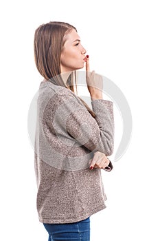 A young girl show gesture quietly. Isolated on white background.