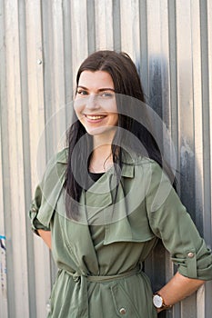 Young girl and silver wall