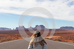 Young girl sits in the center of Forrest Gump Point Road