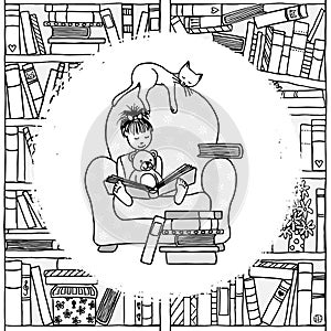 Young girl sitting in an armchair, reading a book