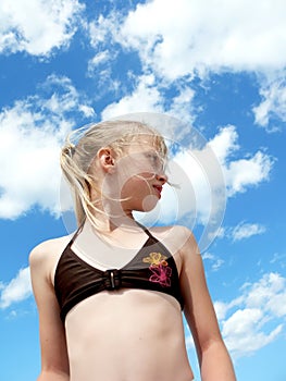 Young girl and sky photo