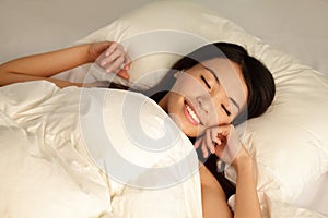 Young girl sleep peaceful at night photo