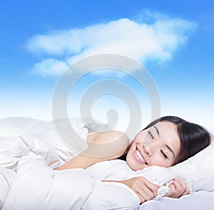 Young girl sleeping on a pillow with white cloud