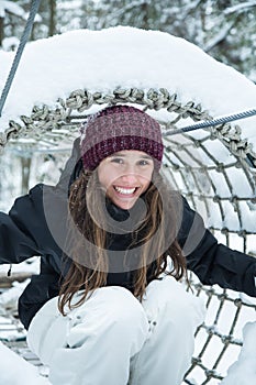 Young girl smiles at winter