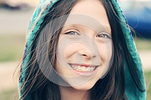 Young Girl Smiling with Long Hair and Hat