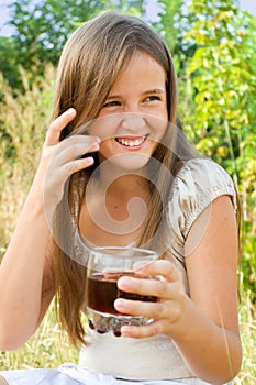 Young girl with soft drink