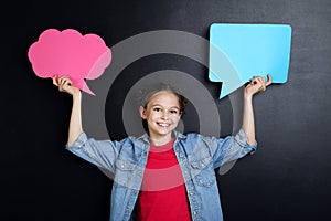 Young girl with speech bubbles