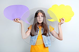 Young girl with speech bubbles