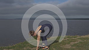 Young girl standing on one leg, balance training, yoga