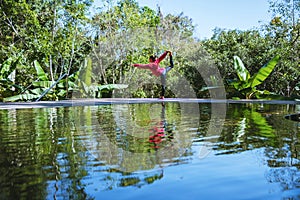 Young girl standing relaxing body, yoga exercise. Hot Springs In National Park,Hot Spring nature travel,Relax and exercise at the