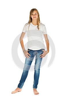 Young girl standing with white t-shirt and blue jeans over white