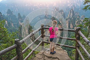 Young girl standing on the Zhangjiajie Tianzi lookout